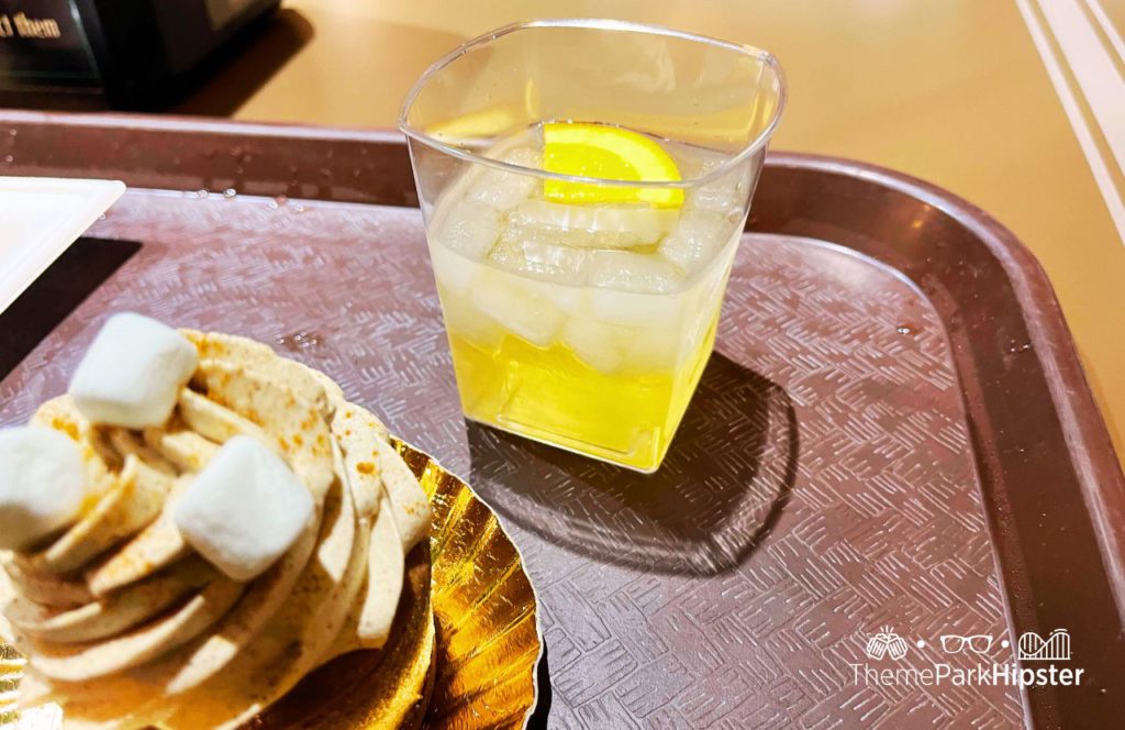 Zero-Proof Piña Colada and Mexican Hot Cocoa Cheesecake and cocktail. Hollywood Studios Jollywood Nights Christmas Celebration at Disney World in Holiday Fiesta en La Calle.