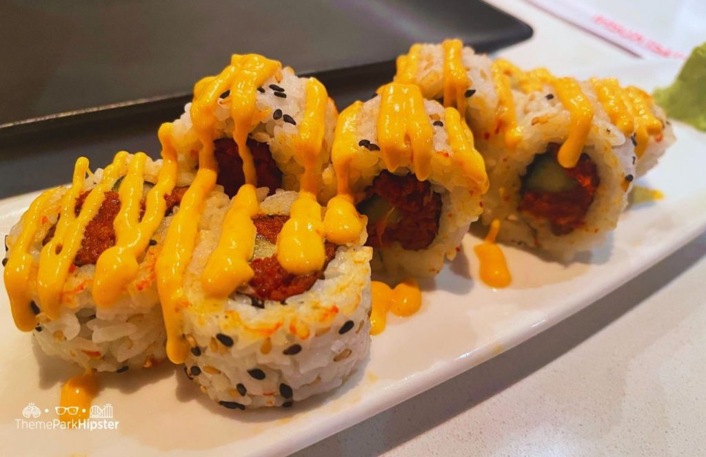 2024 Epcot Festival of the Arts Disney World Teppan Edo Hibachi in Japan Pavilion Spicy Tuna Sushi Roll. One of the best sushi spots in Disney World.