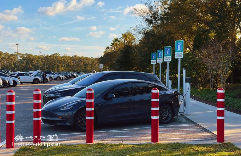 Disney Hollywood Studios Theme Park Electric Vehicle Charging Stations in the Parking Lot. Keep reading to find out more about electric car charging stations at Disney.