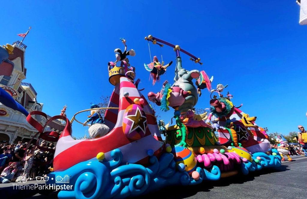 Disney Magic Kingdom Park Disney Festival of Fantasy Parade. Keep reading to learn how to do Disney World on a budget and save money.