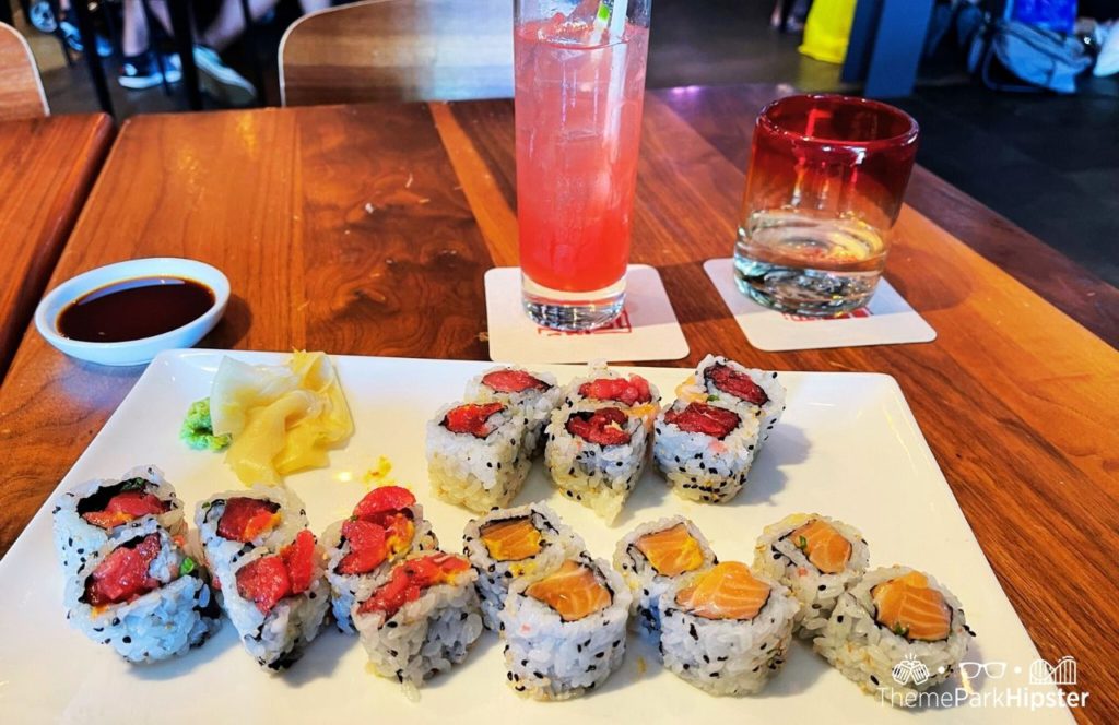 Walt Disney World Disney Springs Morimoto Asia Restaurant Popcorn Chicken Spicy tuna and salmon sushi and Cocktail