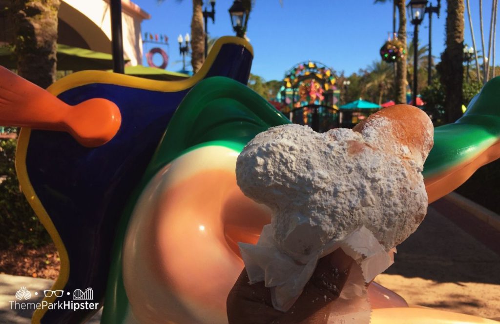 Disney Mickey Mouse Beignet. One of the best Disney Moderate Resorts for Solo Travelers on a Solo Disney Trip.