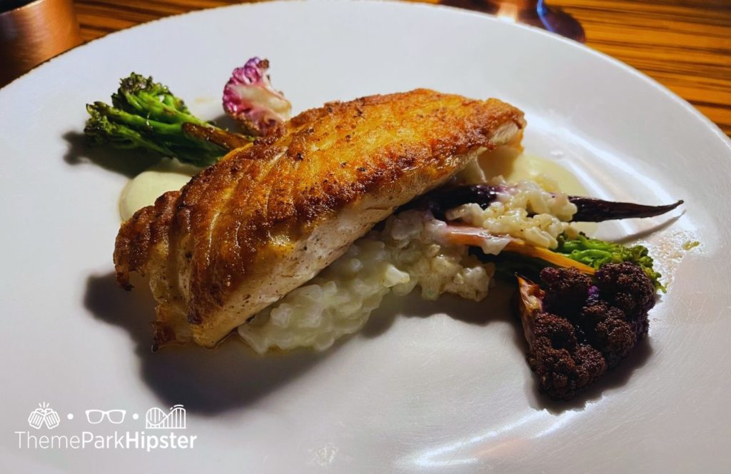 Fish on Risotto with broccoli Todd English's Bluezoo Restaurant bar lounge Swan and Dolphin Resort Hotel at Walt Disney World. Keep reading to learn all there is to know about Walt Disney Swan and Dolphin Resort.