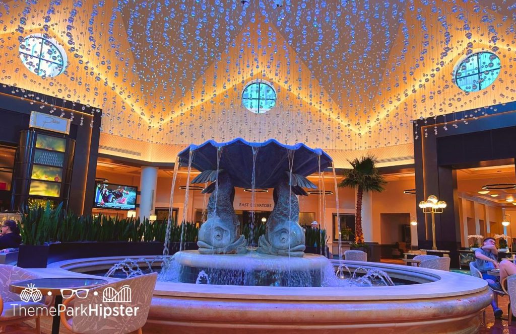 Lobby with fountain Swan and Dolphin Resort Hotel at Walt Disney World. Keep reading to find out more about Swan and Dolphin Resort at Walt Disney World.