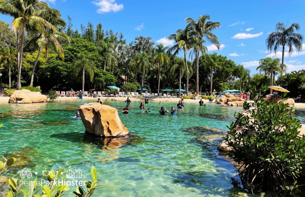 The Grand Reef Snorkeling Discovery Cove All Inclusive Water Park at SeaWorld Orlando. Keep reading to find out all you need to know about Discovery Cove at SeaWorld Orlando.