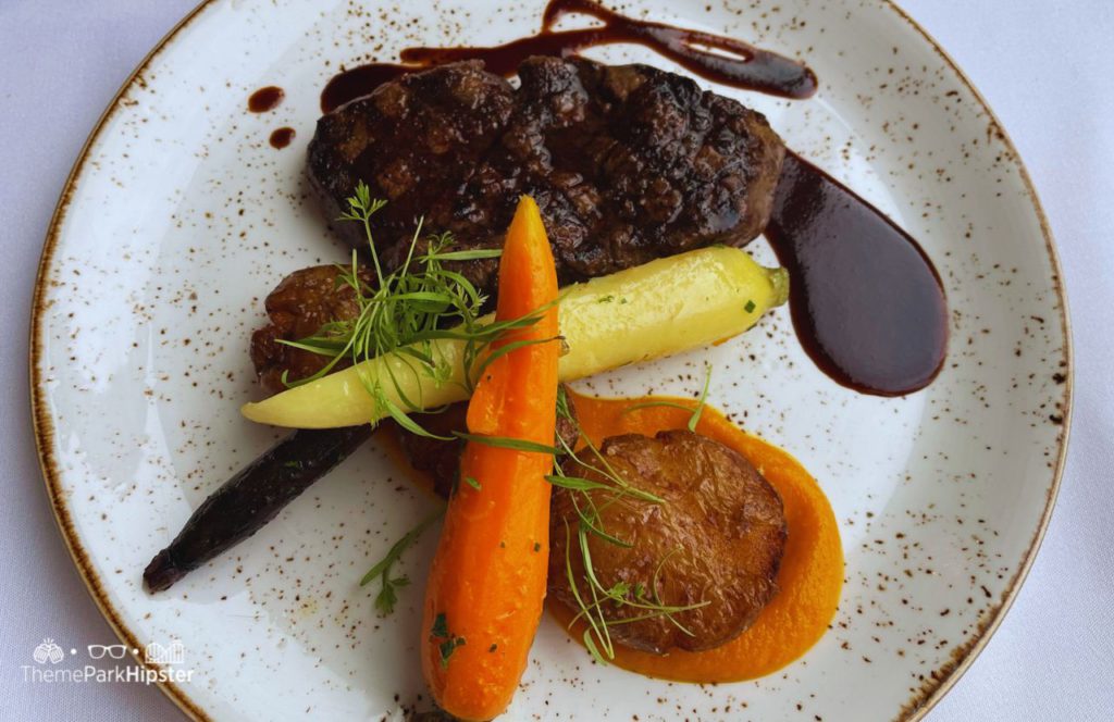 Beef Filet with Carrots at California Grill Restaurant at Disney World's Contemporary Resort. Making it one of the best restaurants at Disney World for adults!