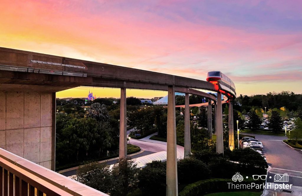 Disney's Contemporary Resort Monorail at Sunset. Keep reading to get the ultimate guide on the best monorail resorts at Disney World.