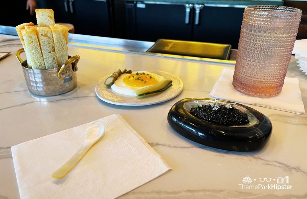 Citricos Restaurant caviar at Disney Grand Floridian Resort. Keep reading to get the full guide to solo dining and eating alone at Disney World.