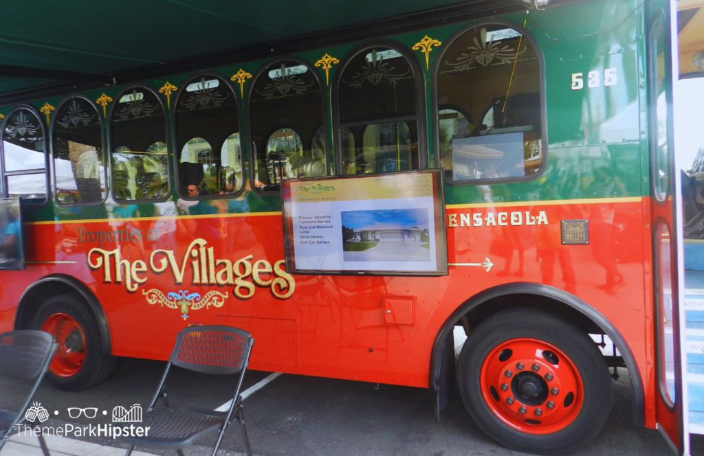 The Downtown Villages in Florida Red Trolley. One of the best places to travel alone in Florida